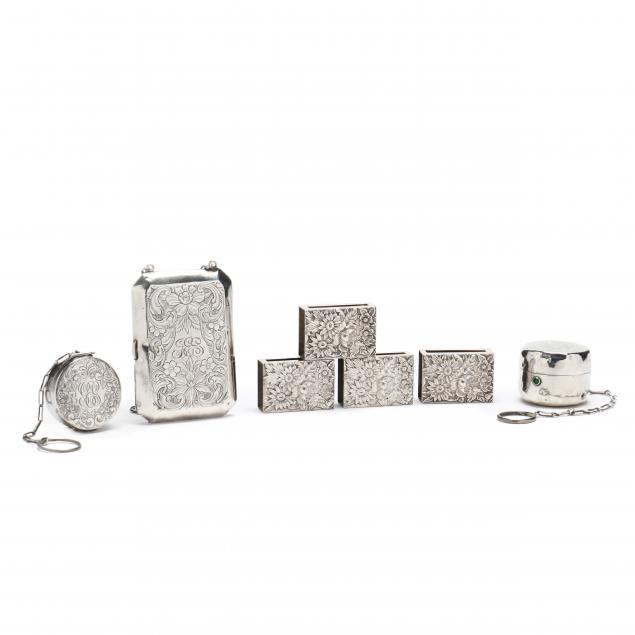 a-grouping-of-seven-silver-accessories