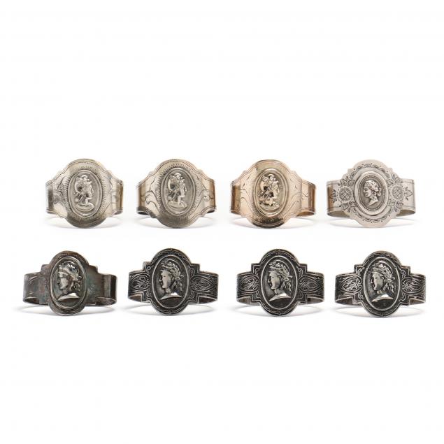 an-assembled-set-of-eight-silverplate-medallion-napkin-rings
