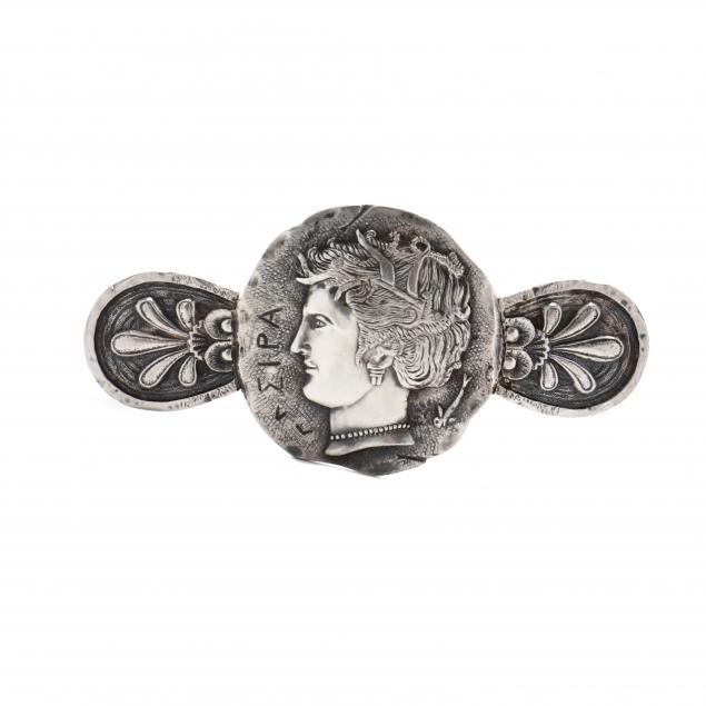 an-antique-sterling-silver-medallion-brooch