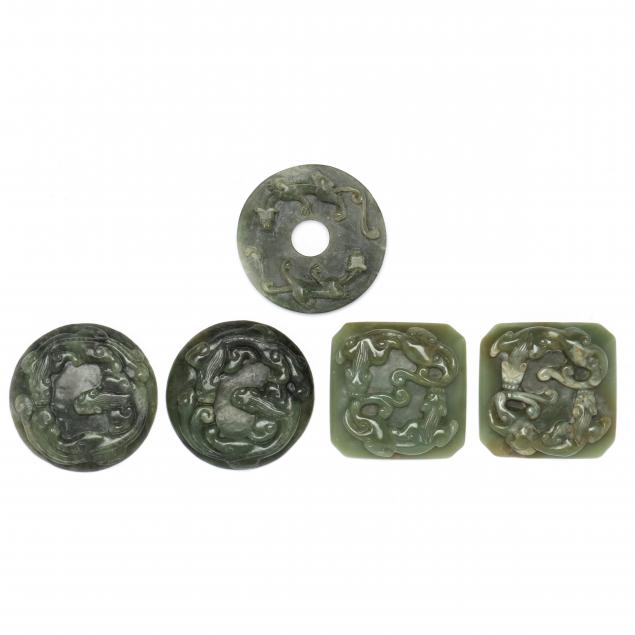 a-group-of-nephrite-jade-chilong-carvings
