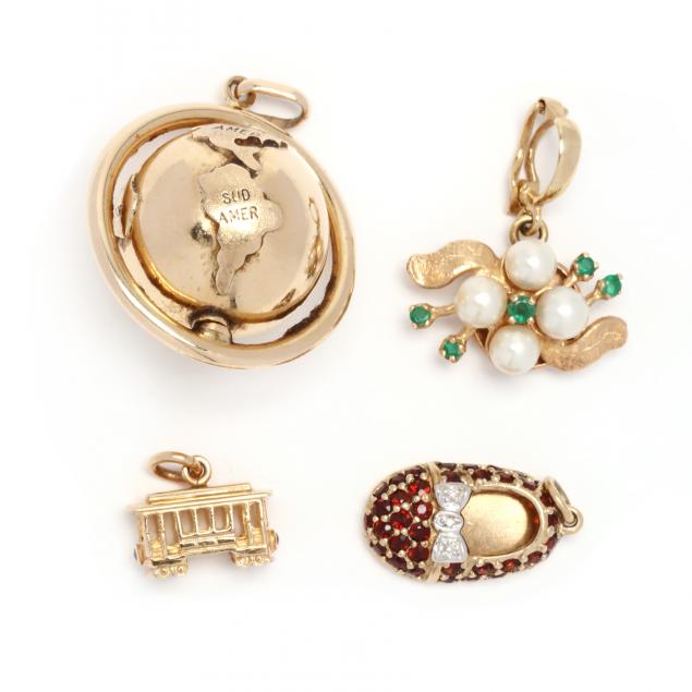 three-gold-charms-and-a-gold-pendant