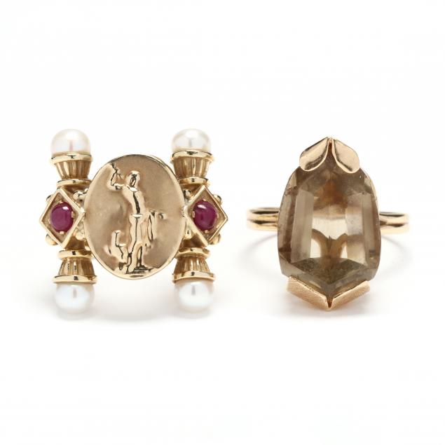 two-gold-and-gem-set-rings