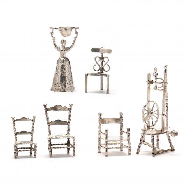 six-silver-miniature-models-of-dollhouse-furniture