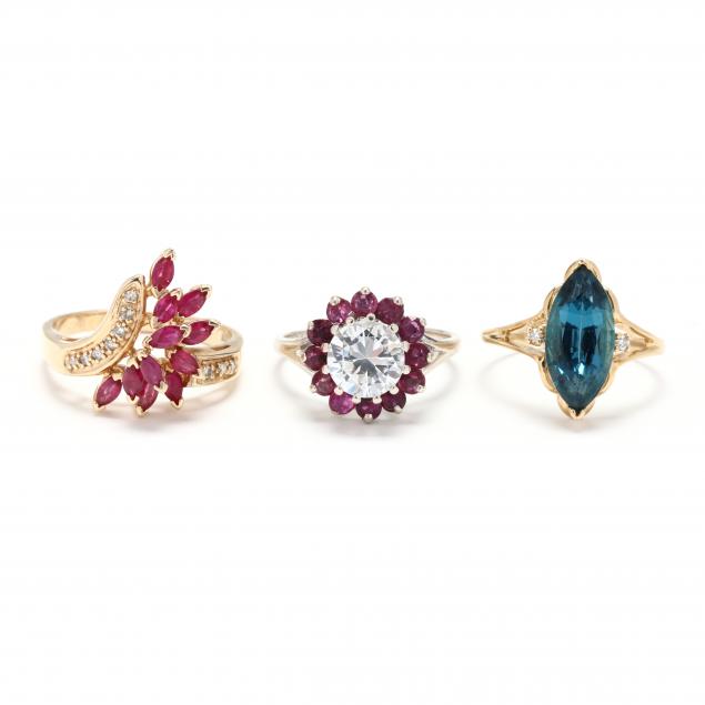 three-gold-and-gem-set-rings