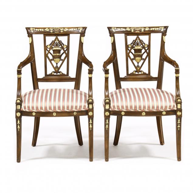 pair-of-continental-neoclassical-style-carved-and-gilt-armchairs