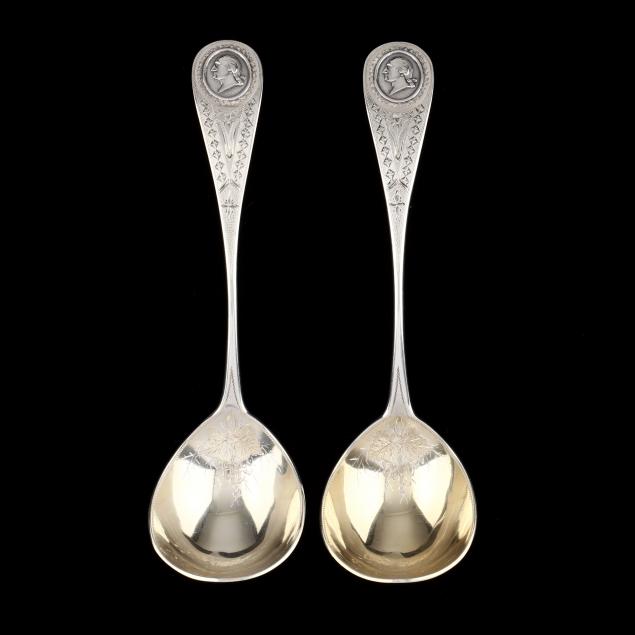 a-pair-medallion-coin-silver-serving-ladles