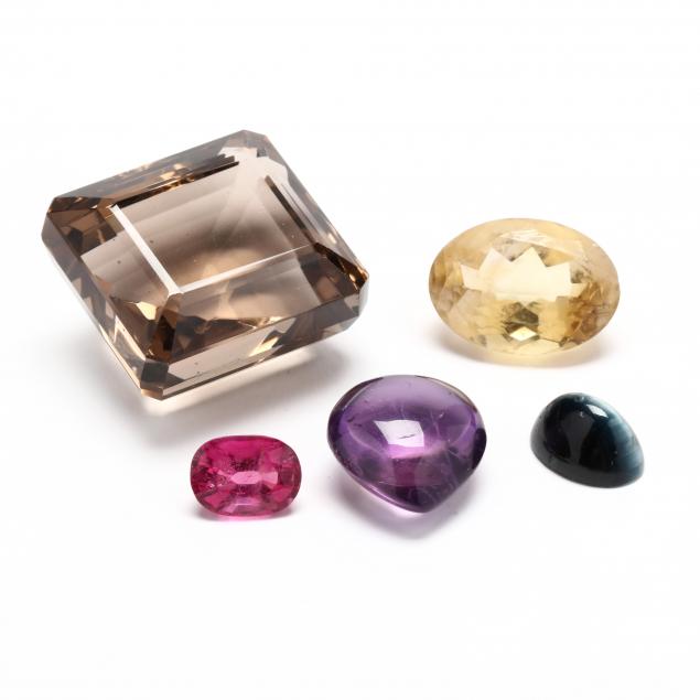 a-group-of-loose-gemstones