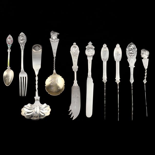 a-grouping-of-american-coin-and-sterling-silver-medallion-pattern-flatware