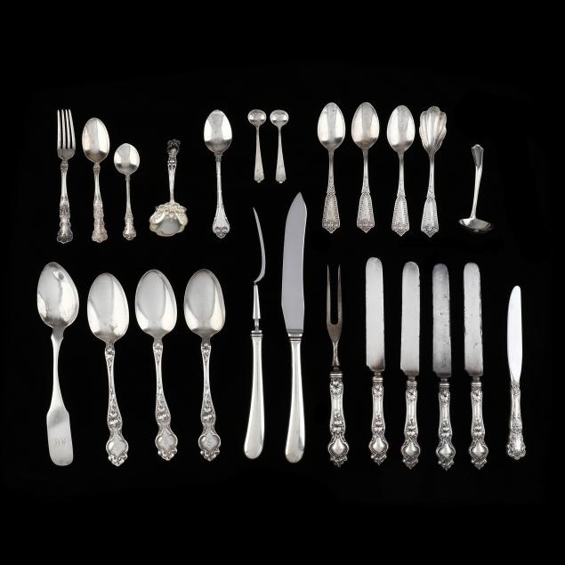 a-grouping-of-sterling-silver-flatware