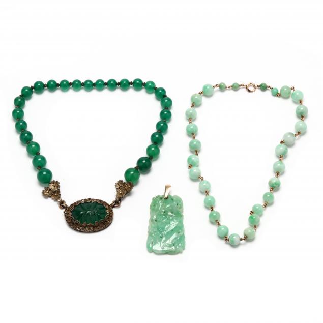 two-jade-jewelry-items-and-a-glass-bead-necklace