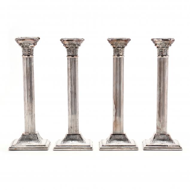 a-set-of-four-antique-neoclassical-style-silverplate-candlesticks