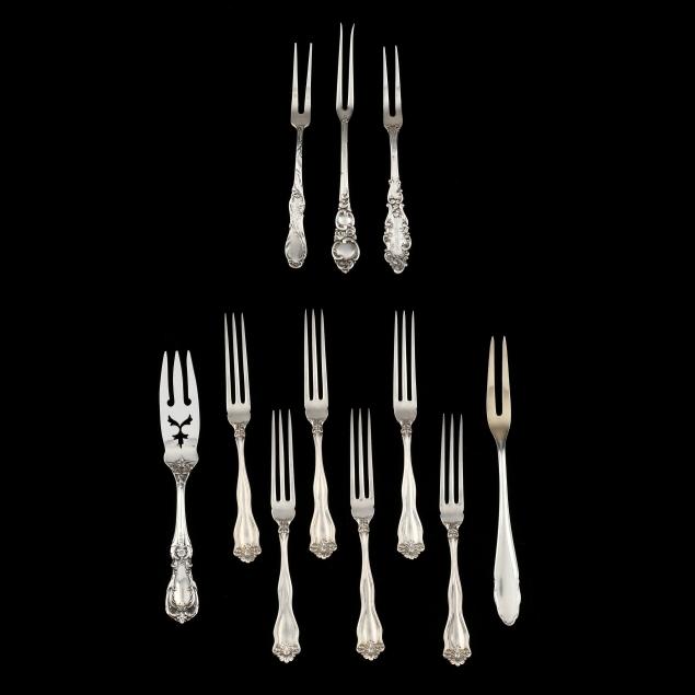 a-collection-of-12-sterling-silver-fruit-forks