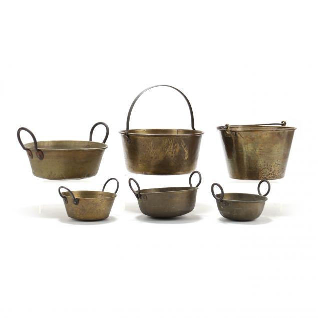 a-selection-of-six-brass-kettles-and-pans