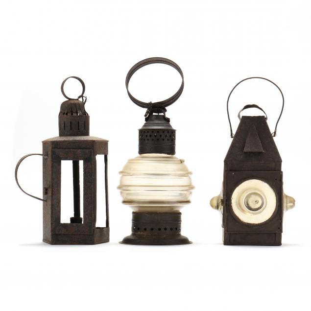 three-antique-tin-lanterns