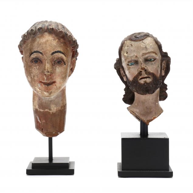 two-spanish-colonial-carved-santos-heads