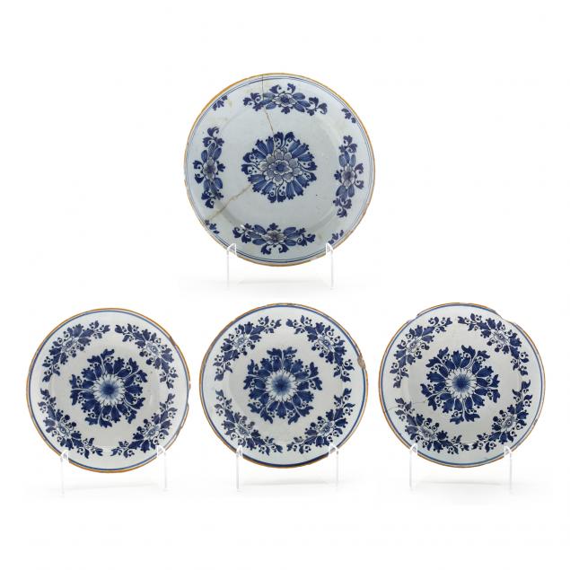 four-dutch-delft-plates-with-matching-blue-and-white-design