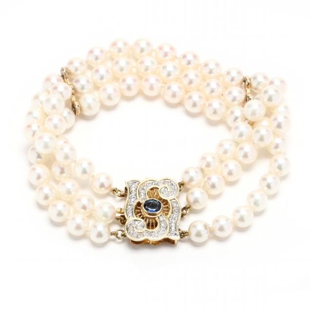 multi-strand-pearl-bracelet-with-gold-and-gem-set-clasp