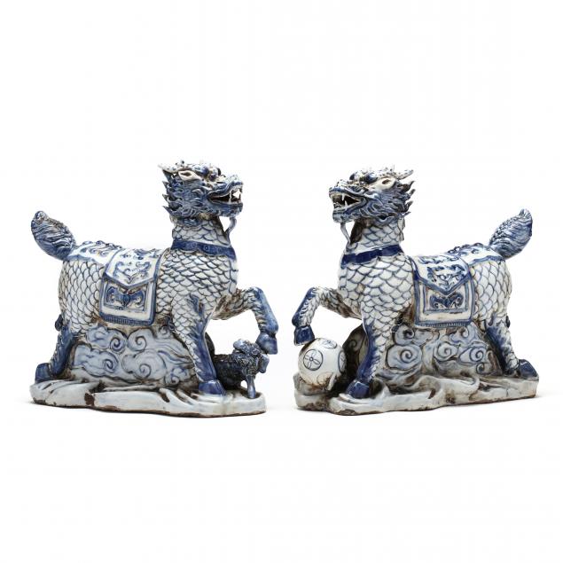 a-pair-of-chinese-blue-and-white-porcelain-mythical-i-qilins-i