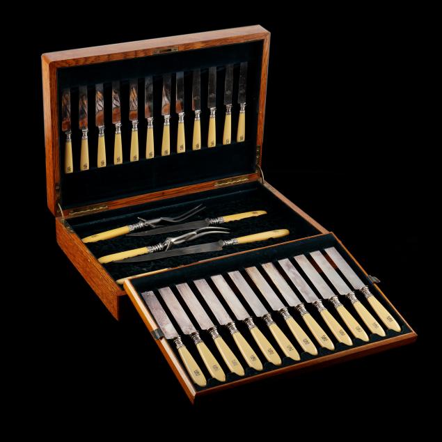 an-antique-set-of-cutlery-in-original-oak-case