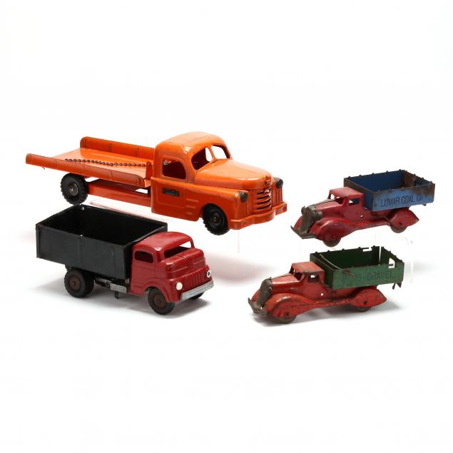 four-vintage-toy-trucks