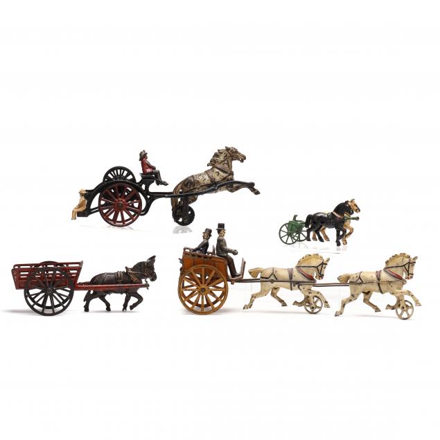 three-antique-cast-iron-toys