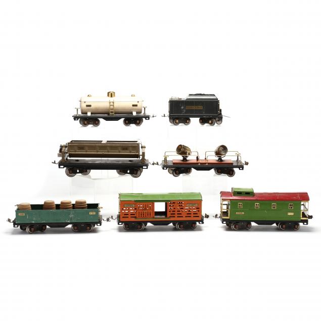 a-group-of-seven-lionel-pre-war-standard-gauge-cars-track-sections