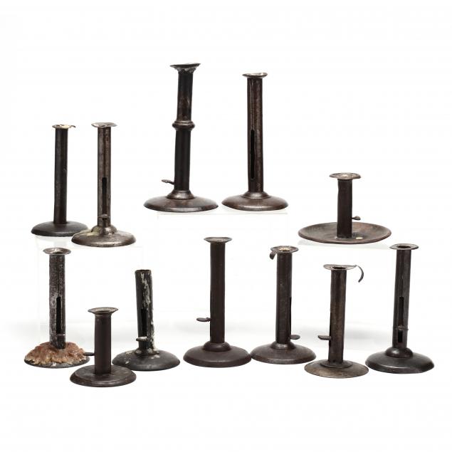 a-grouping-of-twelve-hogscraper-candlesticks