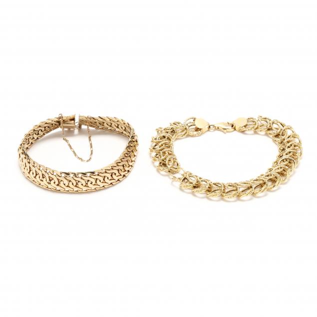 two-gold-bracelets