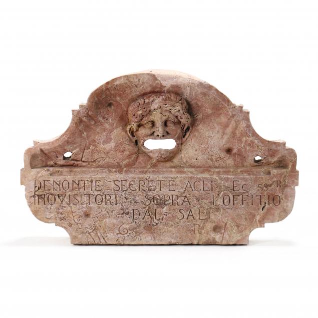 a-romanesque-style-carved-red-hardstone-bocca-di-leone-lion-s-mouth