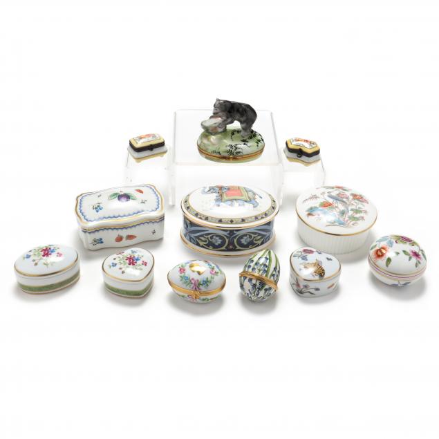 a-selection-of-twelve-porcelain-pill-boxes