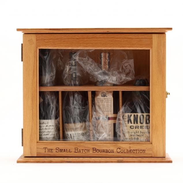 small-batch-bourbon-collection-in-wooden-display-case