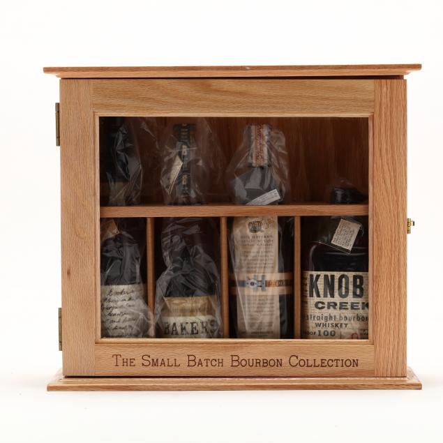 small-batch-bourbon-collection-in-wooden-display-case