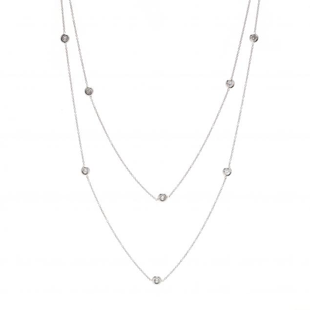 pair-of-platinum-and-diamond-station-necklaces-italy