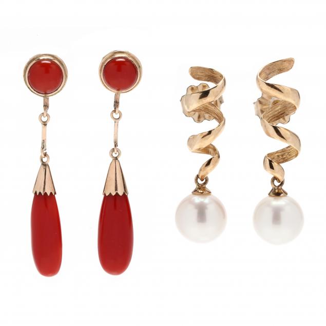 two-pairs-of-gold-dangle-earrings