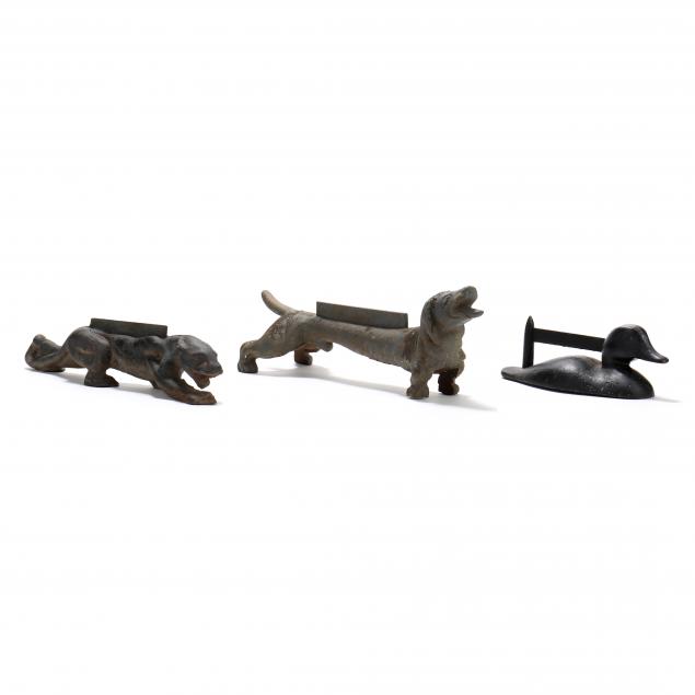 three-vintage-figural-iron-bootscrapes