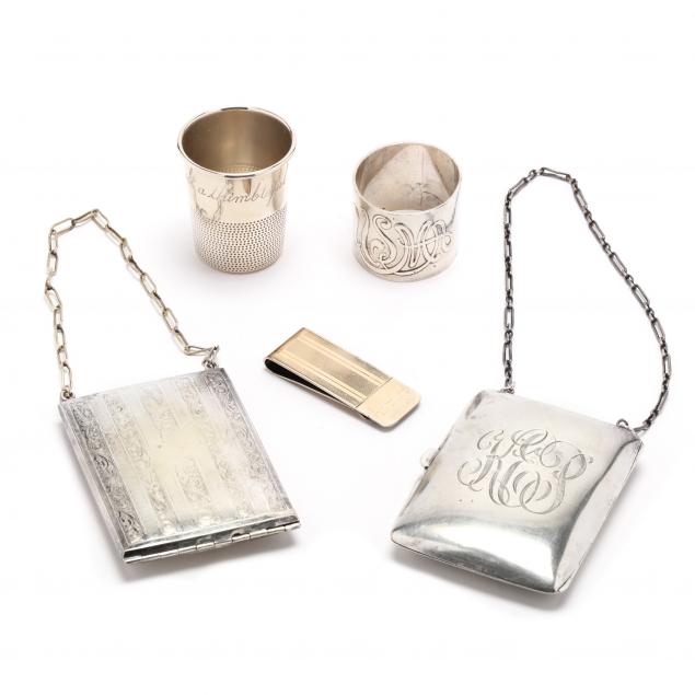a-grouping-of-four-american-sterling-silver-accessories