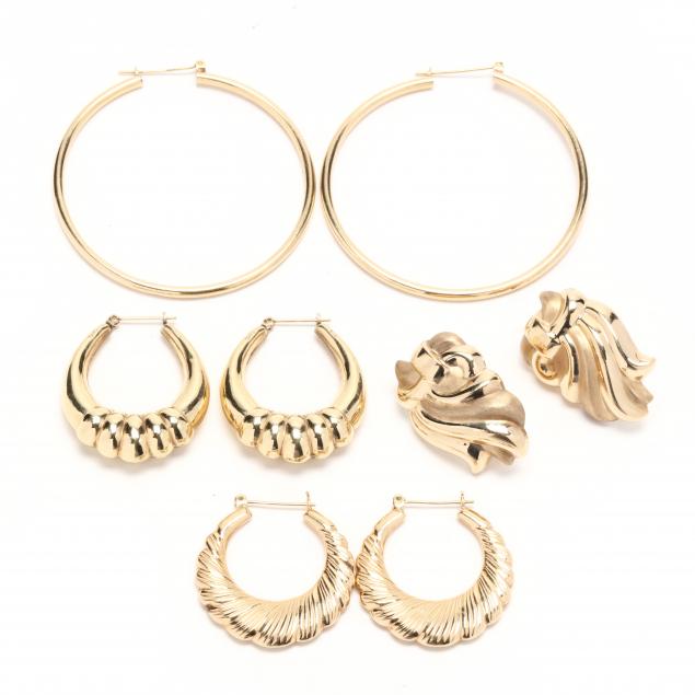 four-pairs-of-gold-earrings