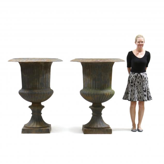 a-pair-of-palatial-size-cast-iron-garden-urns