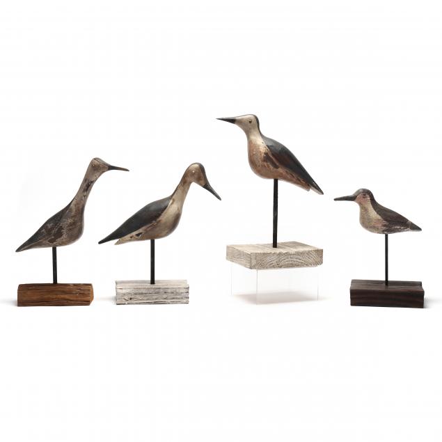 a-grouping-of-four-decorative-shore-bird-decoys