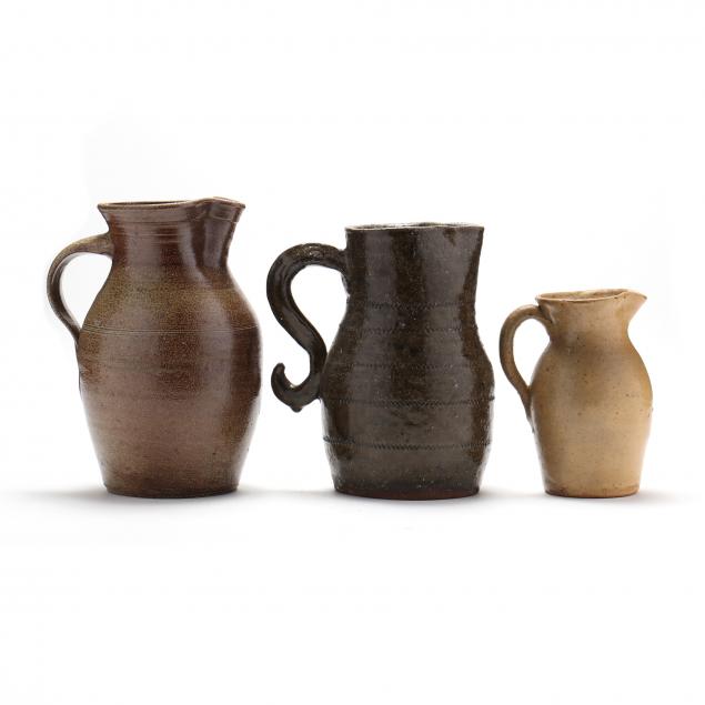 three-southern-pottery-stoneware-pitchers