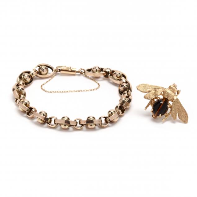 vintage-gold-bracelet-and-a-gem-set-bee-brooch