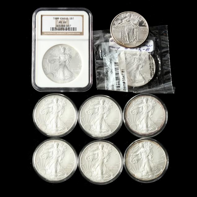 eight-8-silver-american-eagles-and-a-private-one-ounce-silver-round