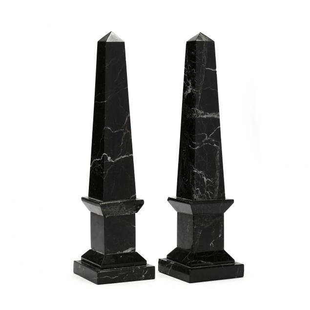 a-pair-of-black-marble-obelisks