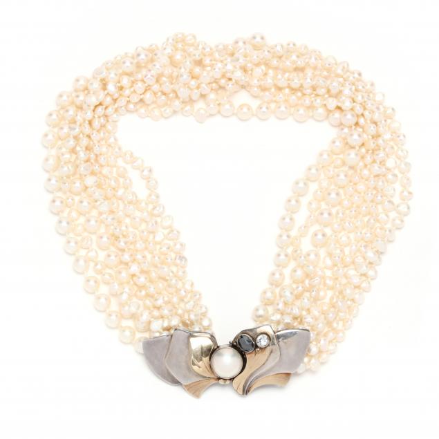 pearl-torsade-necklace-with-silver-and-gem-set-clasp
