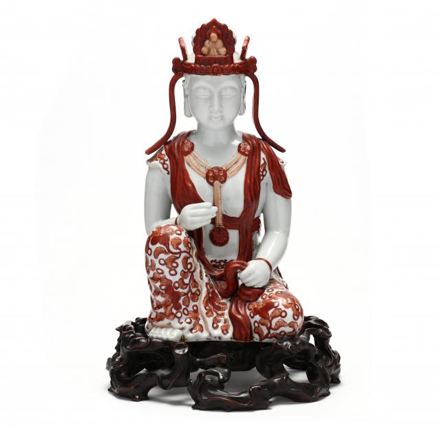 a-porcelain-seated-guanyin-sculpture