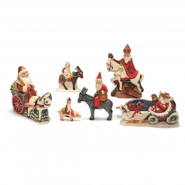 selection-of-six-vaillancourt-santa-figures-using-animal-transport