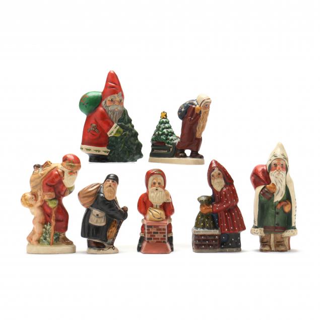 selection-of-seven-vaillancourt-santa-figures-carrying-sacks