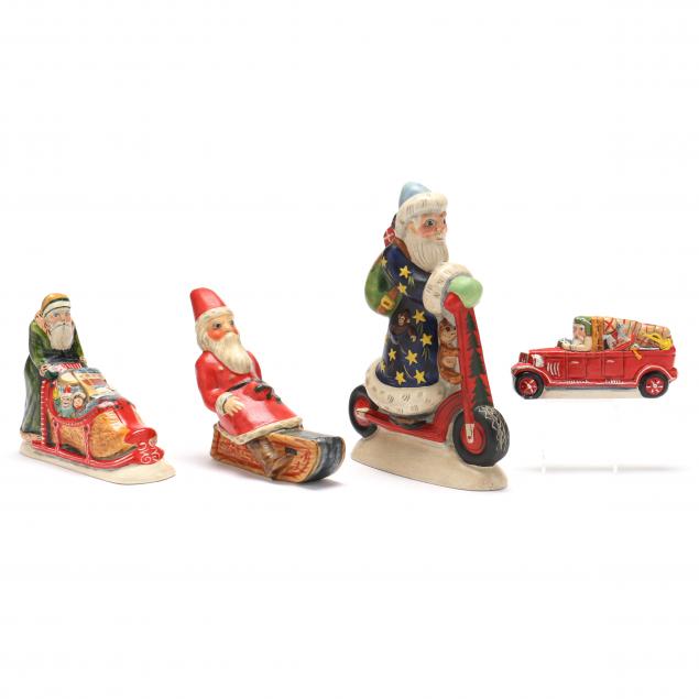 four-vaillancourt-santa-figures-riding-vehicles