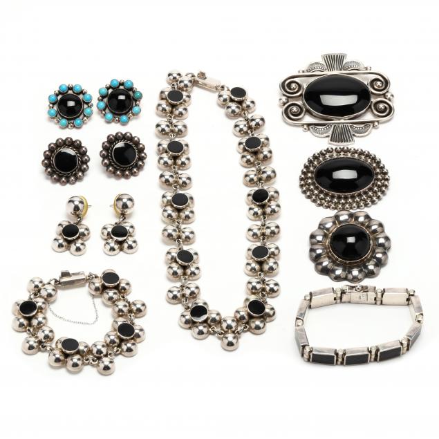 group-of-silver-and-onyx-jewelry