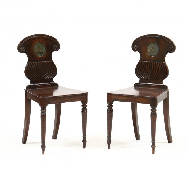 pair-of-william-iv-carved-and-painted-mahogany-hall-chairs